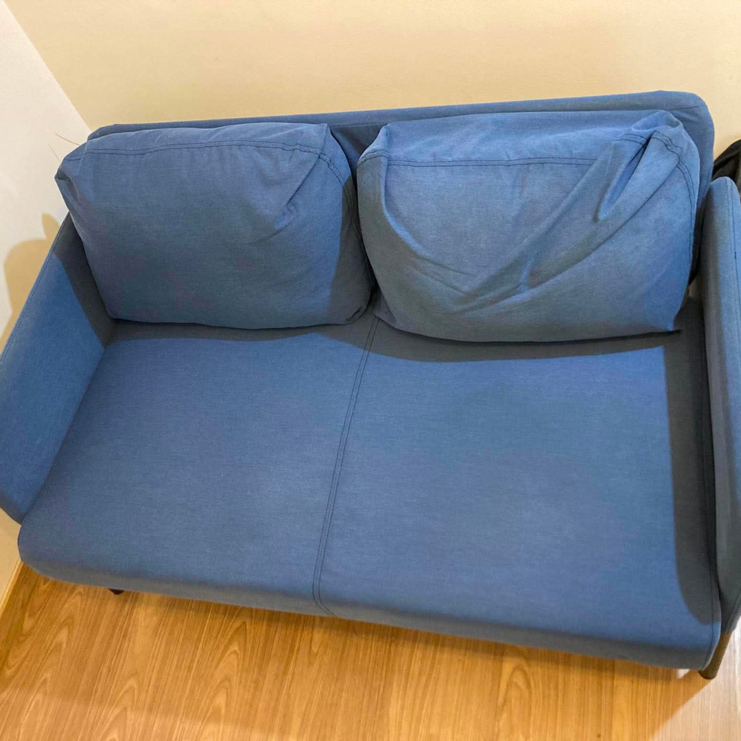 Blue loveseat after deep clean