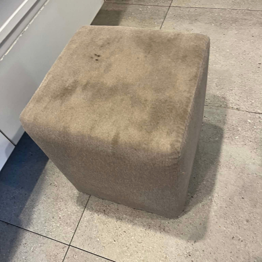Ottoman before deep clean